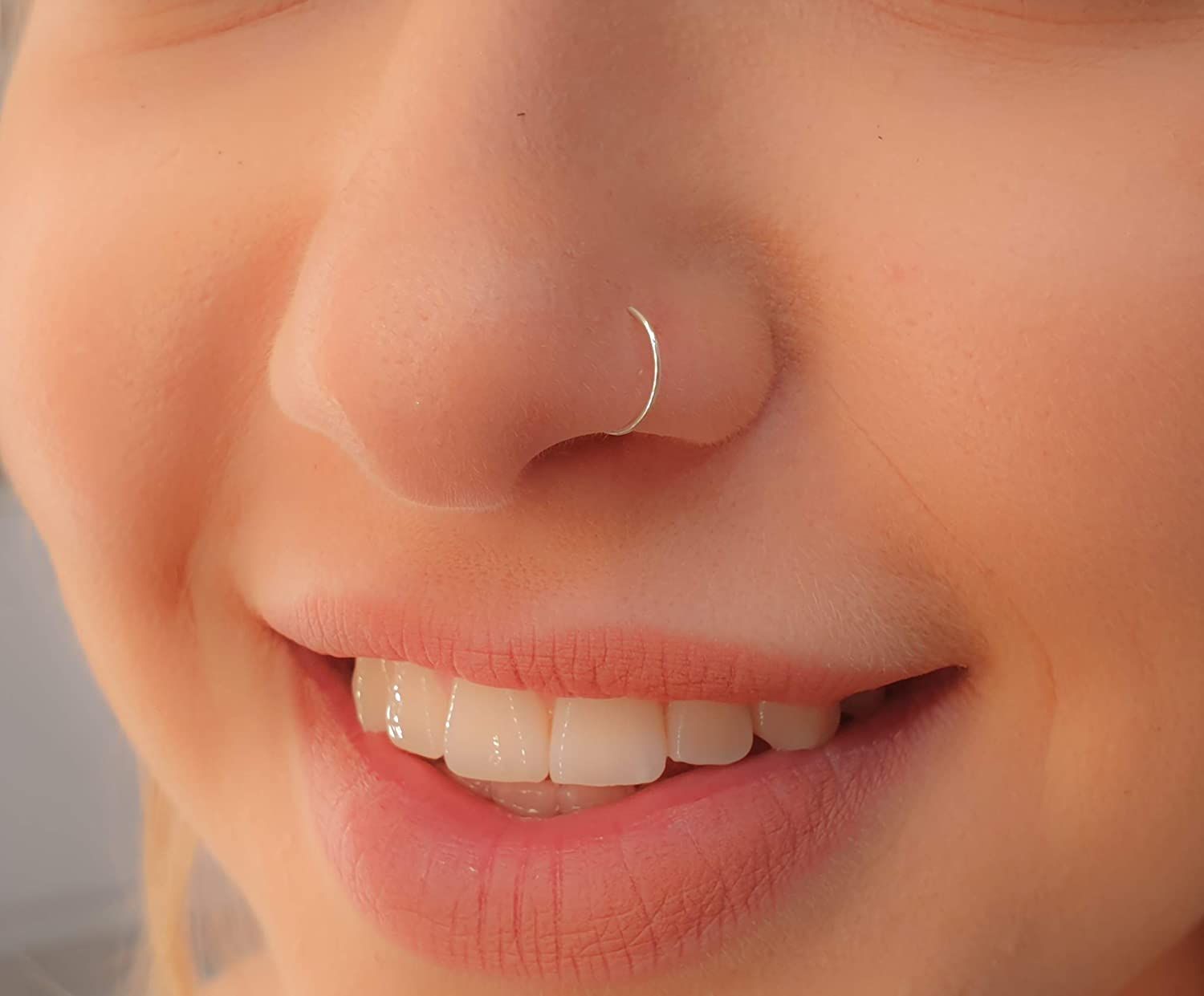 20 Eye Catching Hoop Nose Piercing Pictures Sheideas