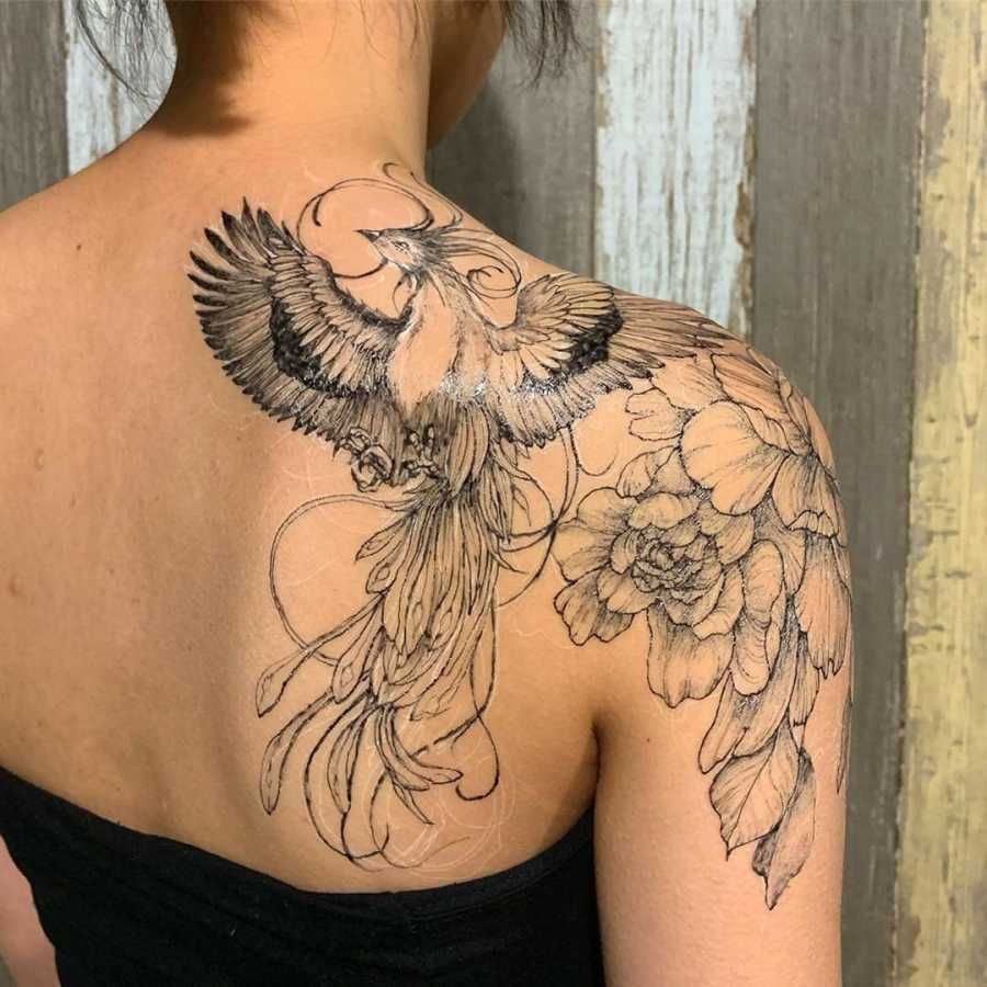 20 Phoenix Tattoos That Show Off A Woman Amp 39 S Inner Fire Phoenix Tattoo Design Pheonix Tattoo