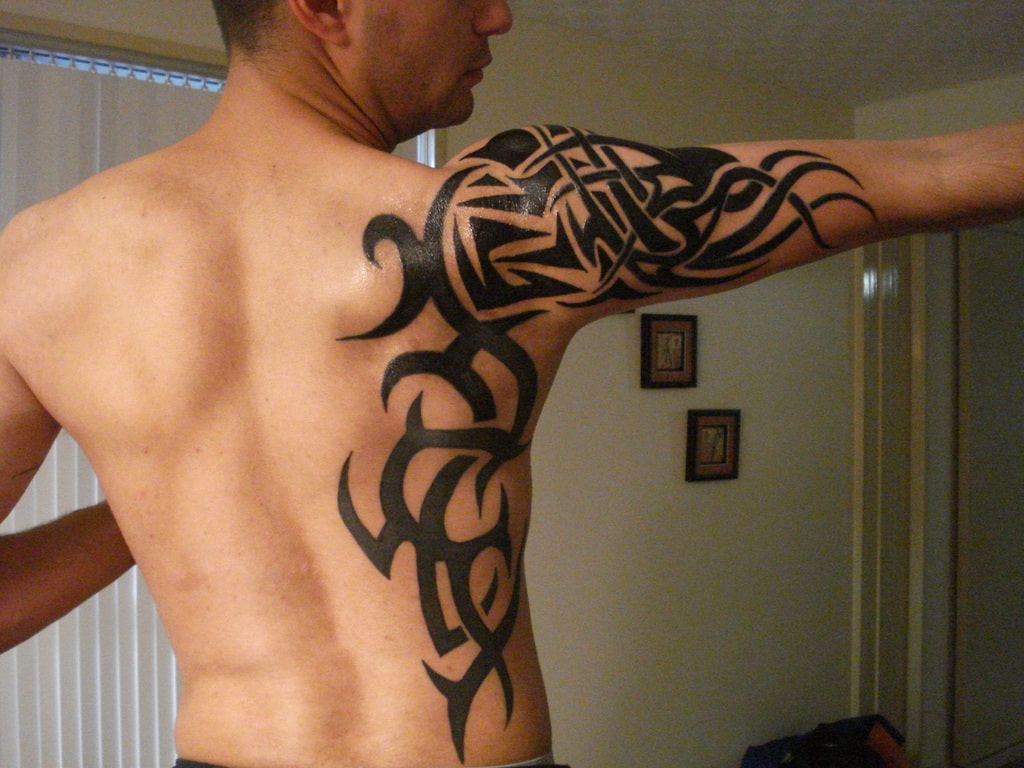 28 Insanely Cool Tribal Tattoos For Men Designbump