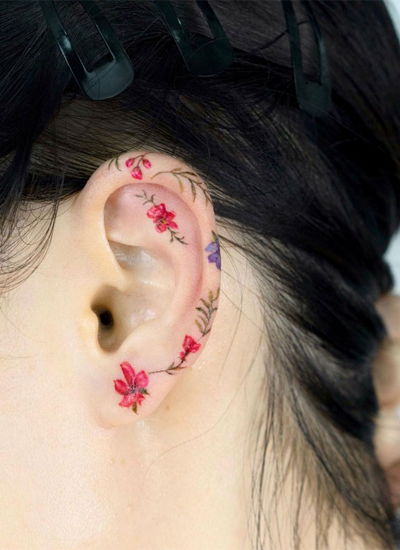 30 Beautiful Flower Tattoo Ideas Colourful Tiny Flower Tattoo On Ear