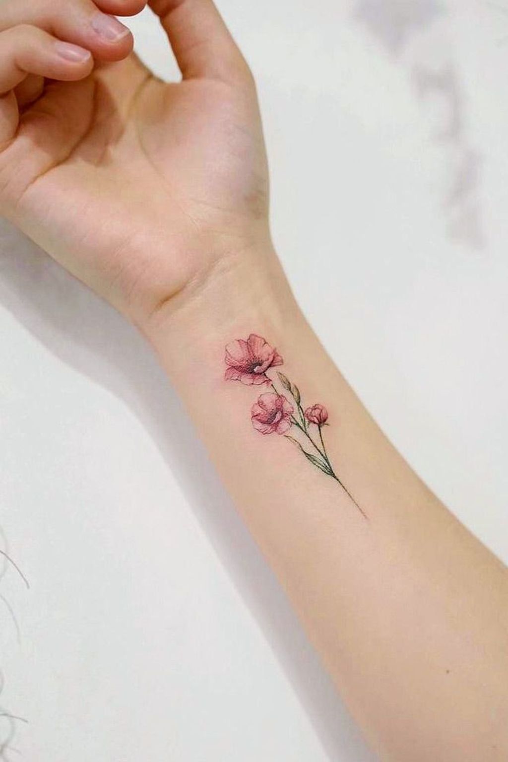 30 Beautiful Flower Tattoo Ideas Poppy Tattoo Above Wrist I Take You