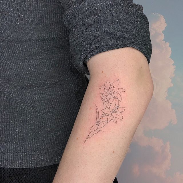 30 Botanical Floral Lily Tattoo Designs On Arms Bring A Touch Of