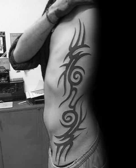 40 Cool Tribal Rib Tattoos For Men