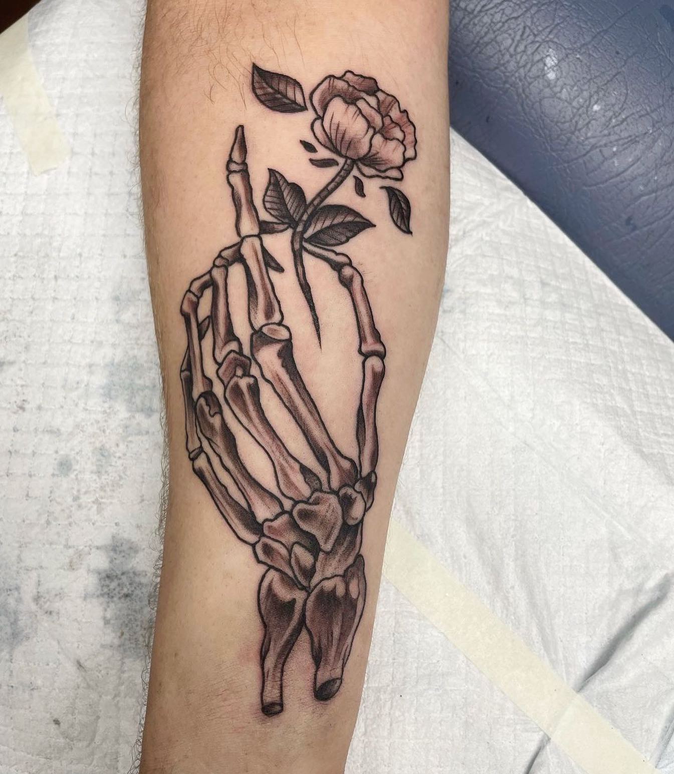 61 Skeleton Hand Tattoo Ideas With Deep Meanings