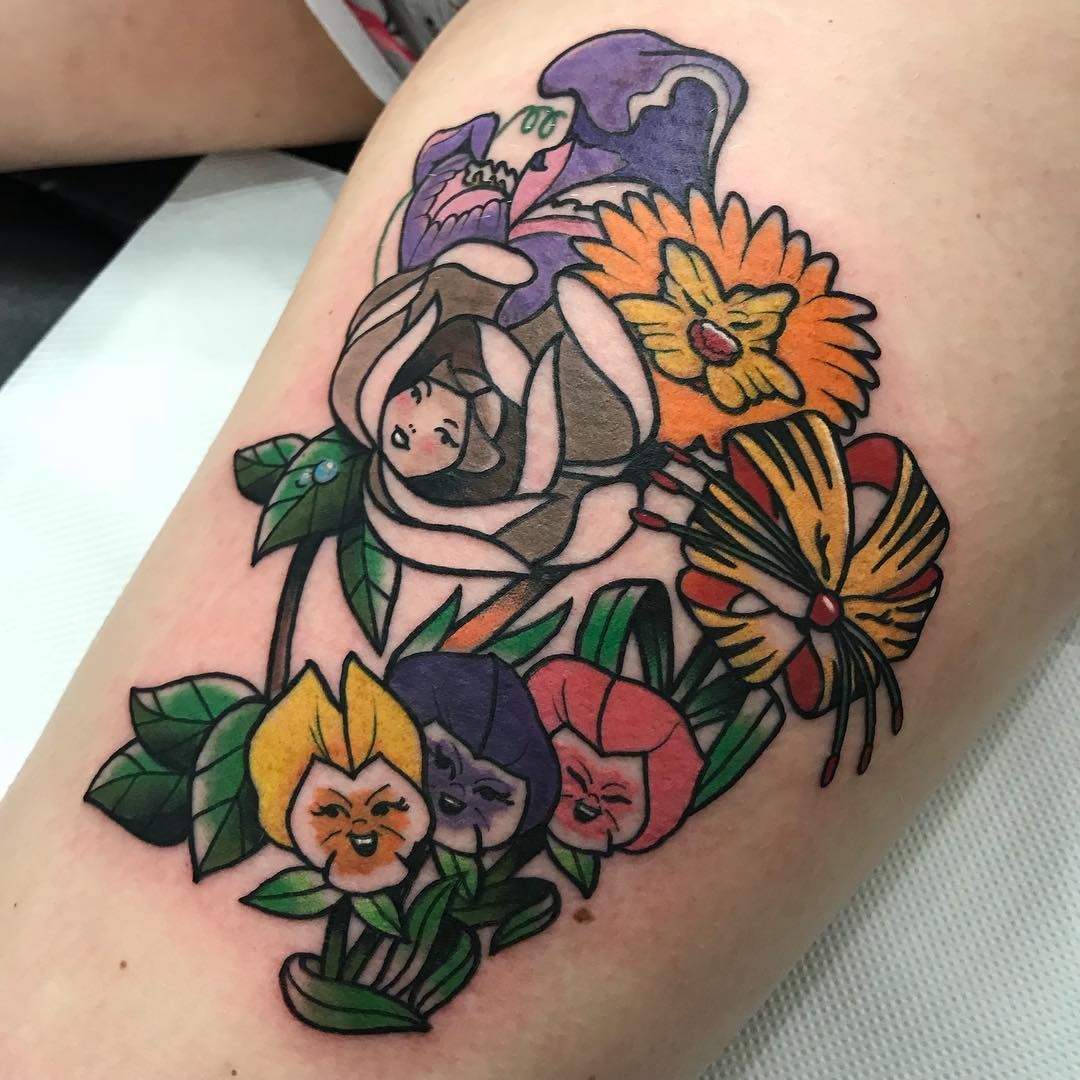 5 Stunning Alice in Wonderland Flower Tattoo Ideas