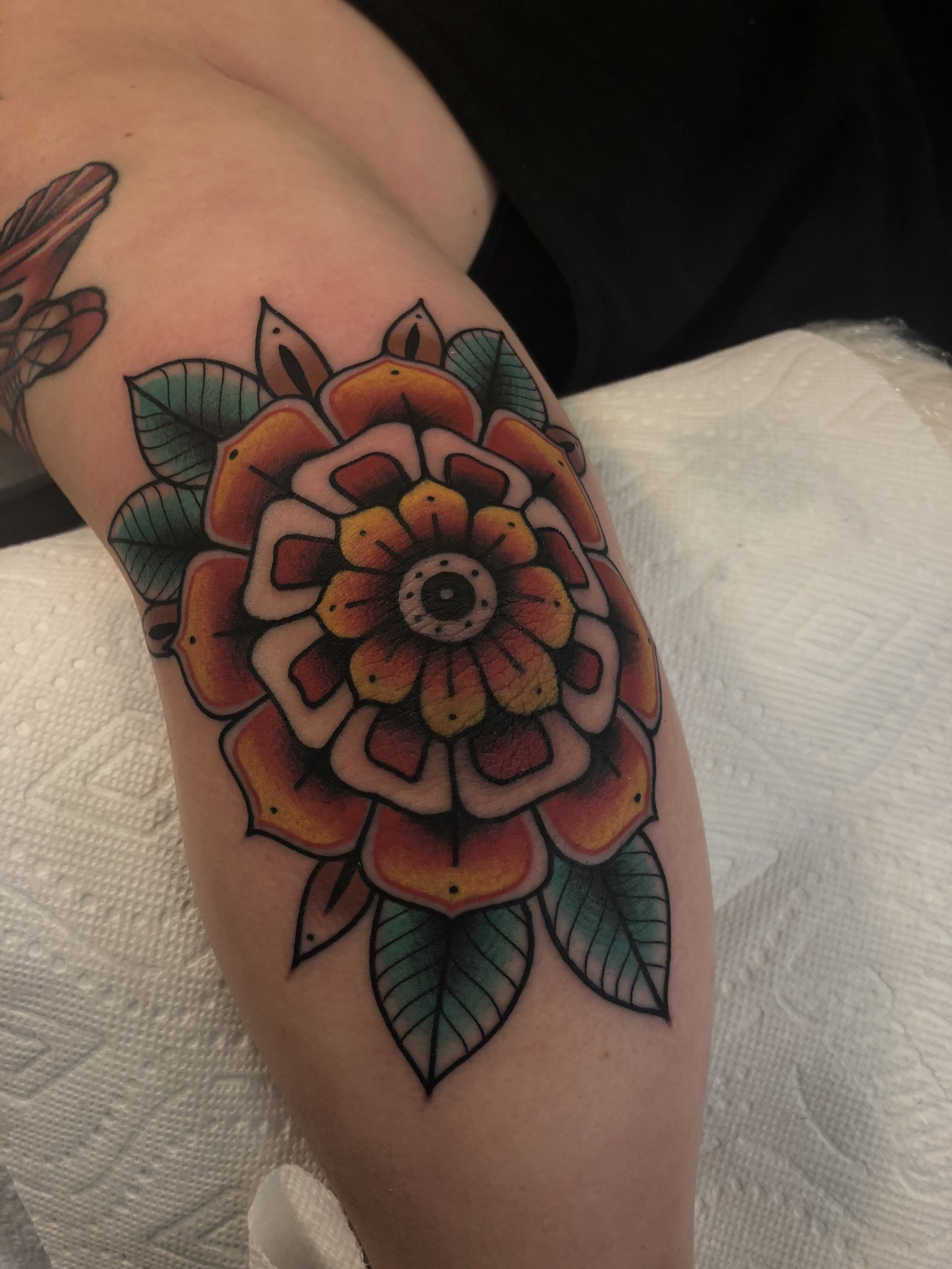 American Traditional Pin Wheel Elbow Tattoo By Jake Bray Think Tank