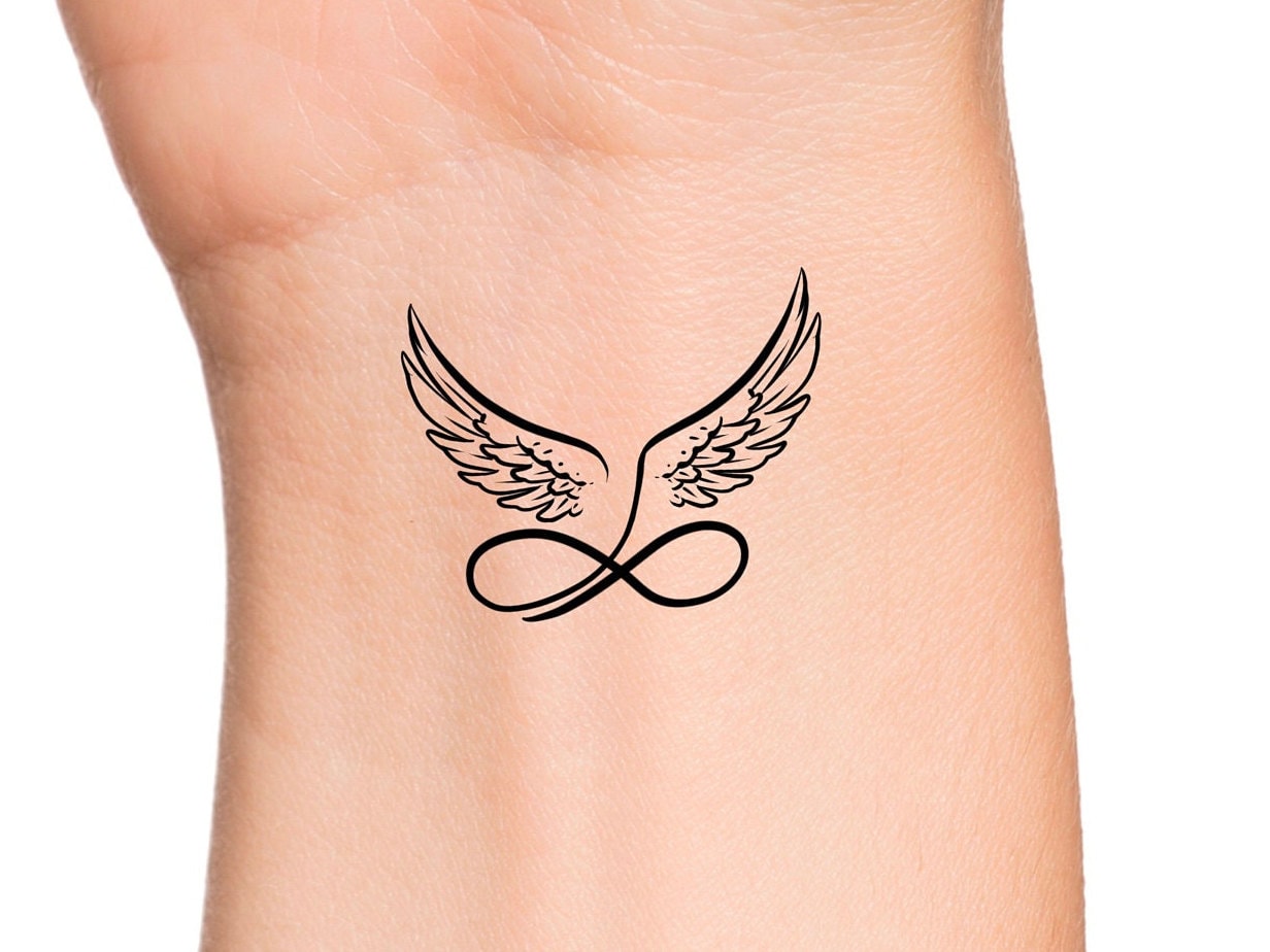 Angel Wings Tattoo With Infinity Halo Popped My Tattoo Cherry Love It