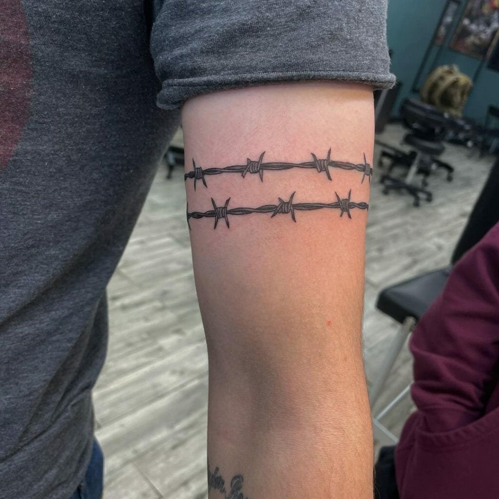 Barbed Wire Rose Tattoo In 2024 Barbed Wire Tattoos Basic Tattoos