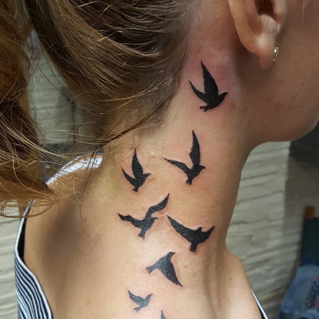 Bird Tattoos Across Back