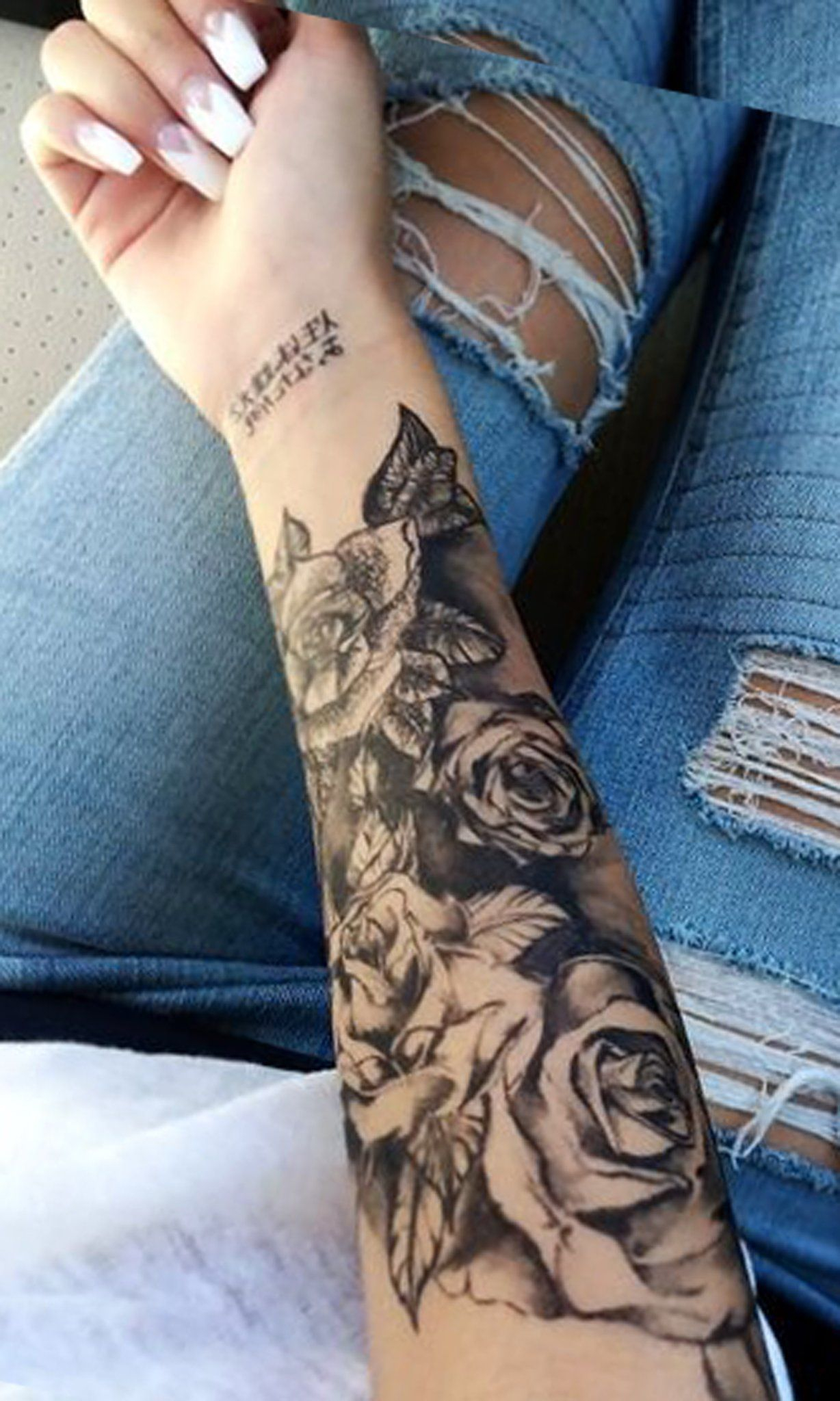 Black Contour Flower Tattoo Sleeve On Forearm Tattooimages Biz