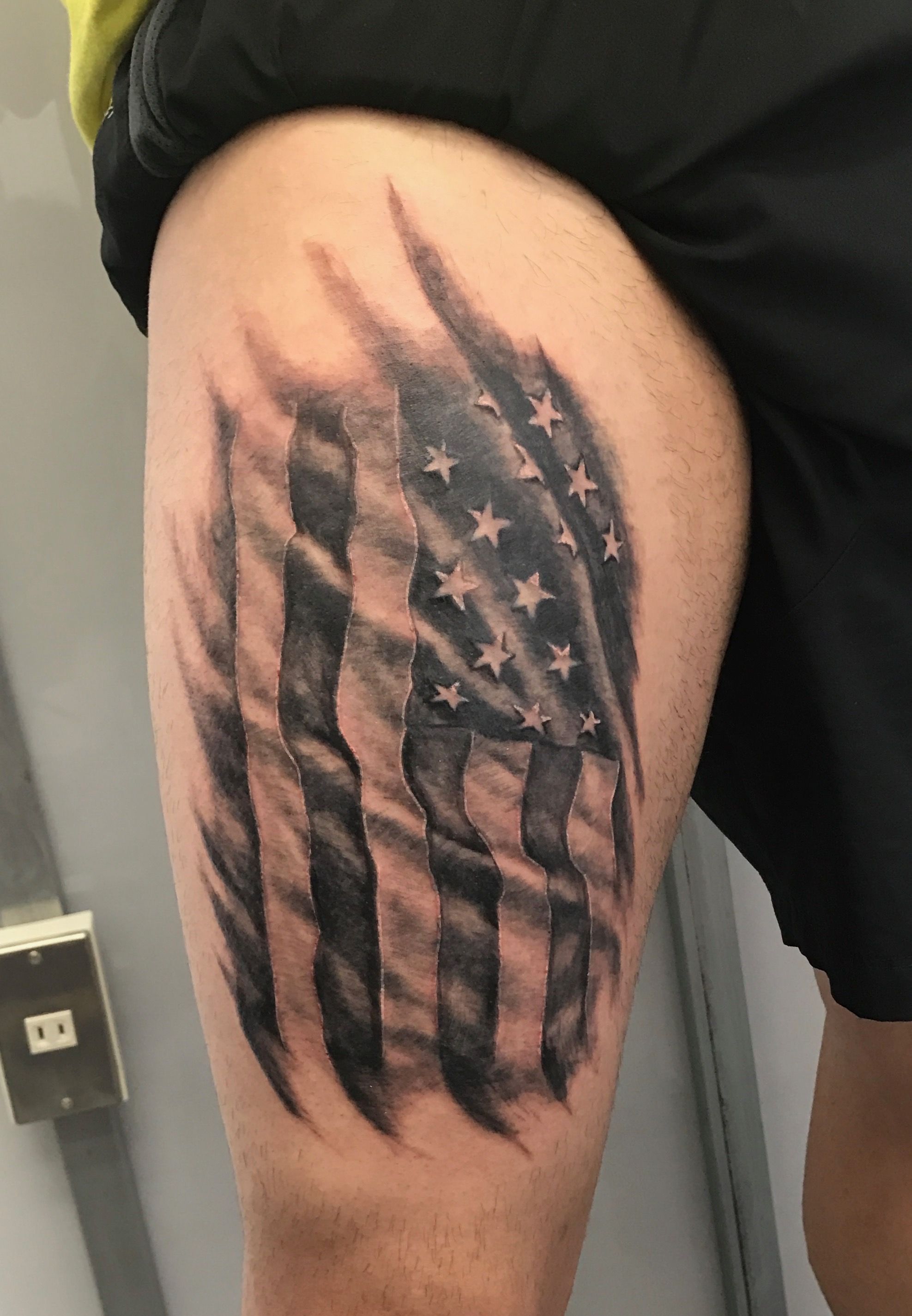 5 Reasons to Get a Black Ripped American Flag Tattoo