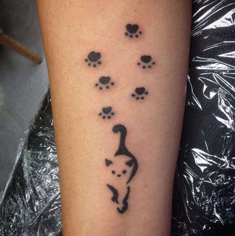 Cat And Paw Prints Tattoo By Chelsea Cleveland By Smilinpiratetattoo