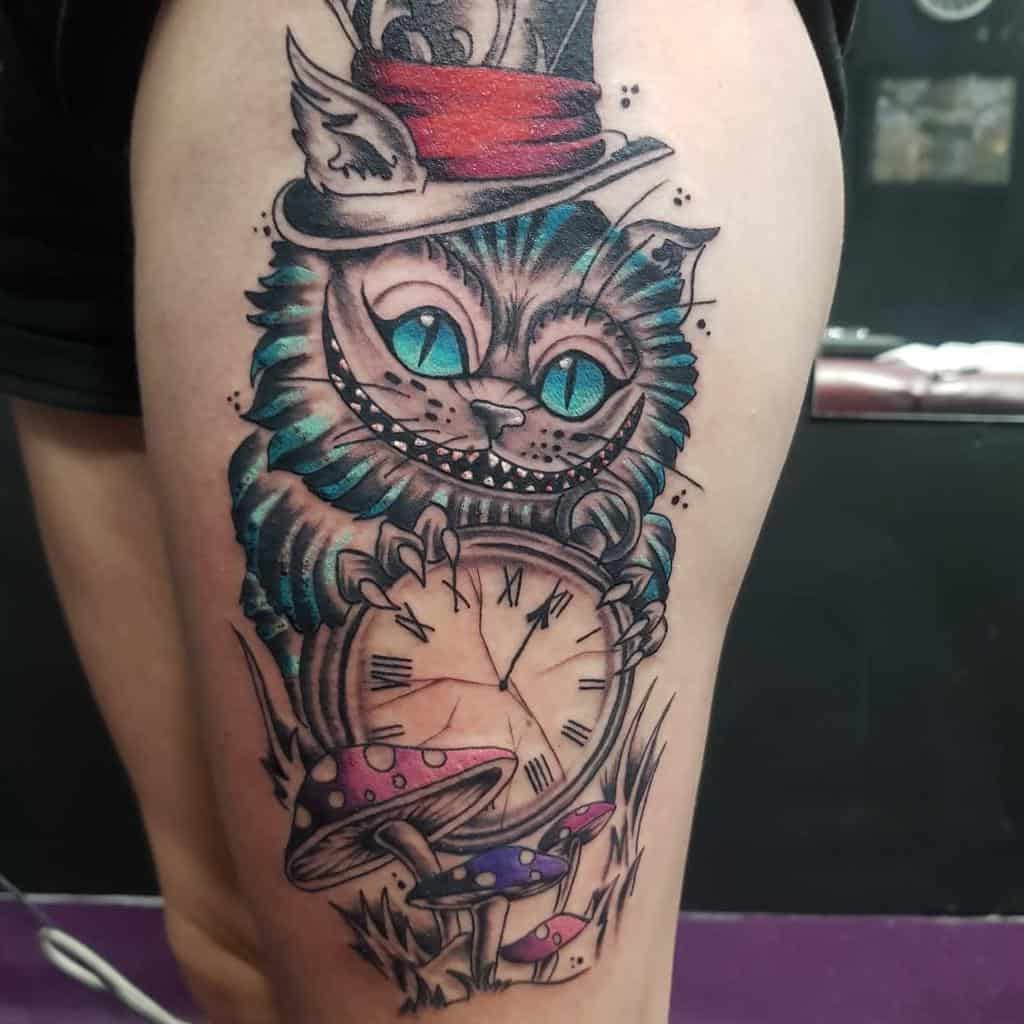 10 Unique Cheshire Cat Tattoo Design Ideas