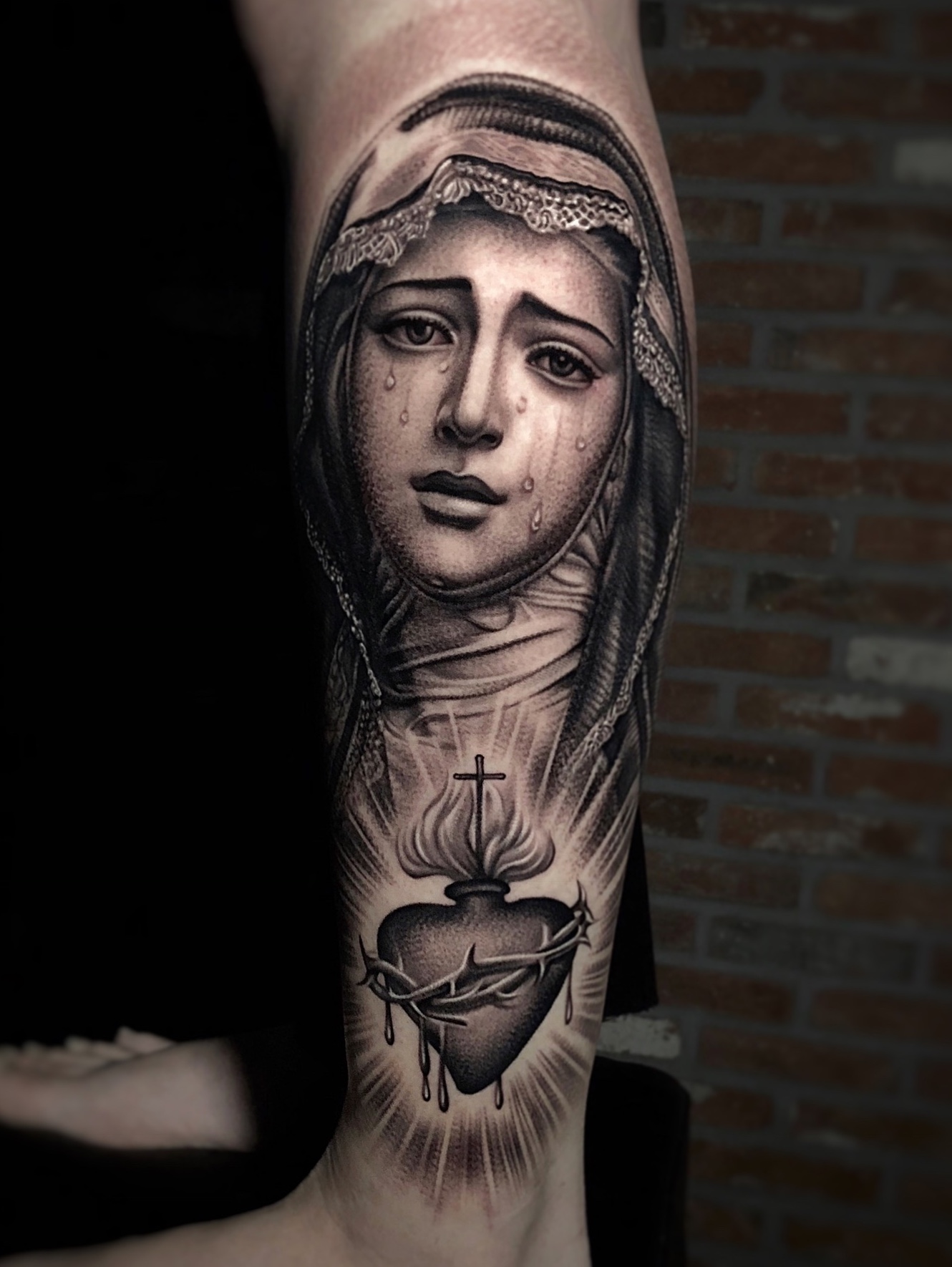 Unveiling the Mystery: Crying Virgin Mary Tattoo