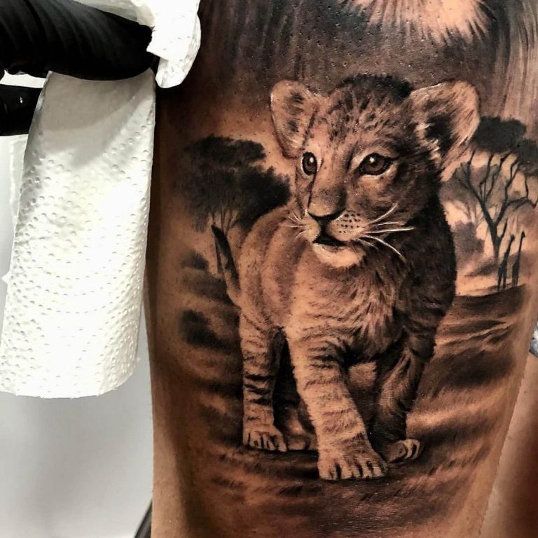 Cub and Lion Tattoo: Symbolism and Designs