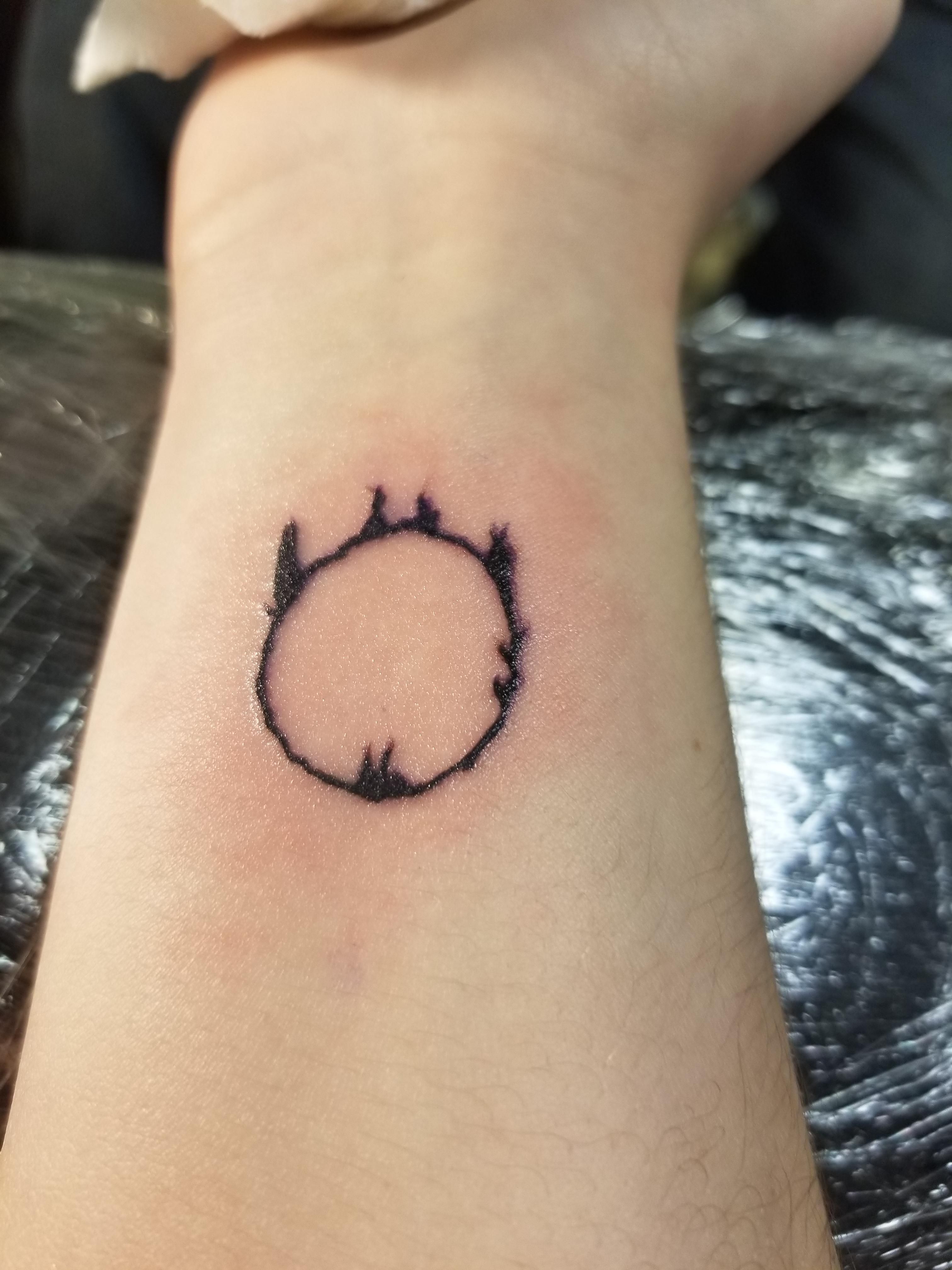 5 Stunning Dark Sign Tattoo Designs for Gamers