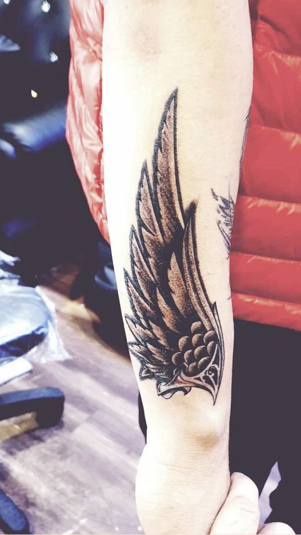 Eagle Wings Tattoo On Exterior Forearm Tattoos Anthem Jhaiho