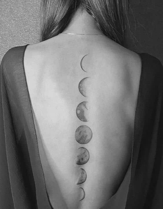 Elegant Moon Phases Spine Tattoo Ideas