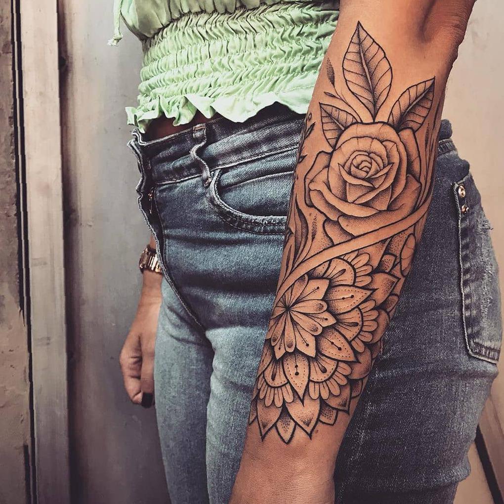 10 Stunning Female Arm Tattoo Designs for Inspiration