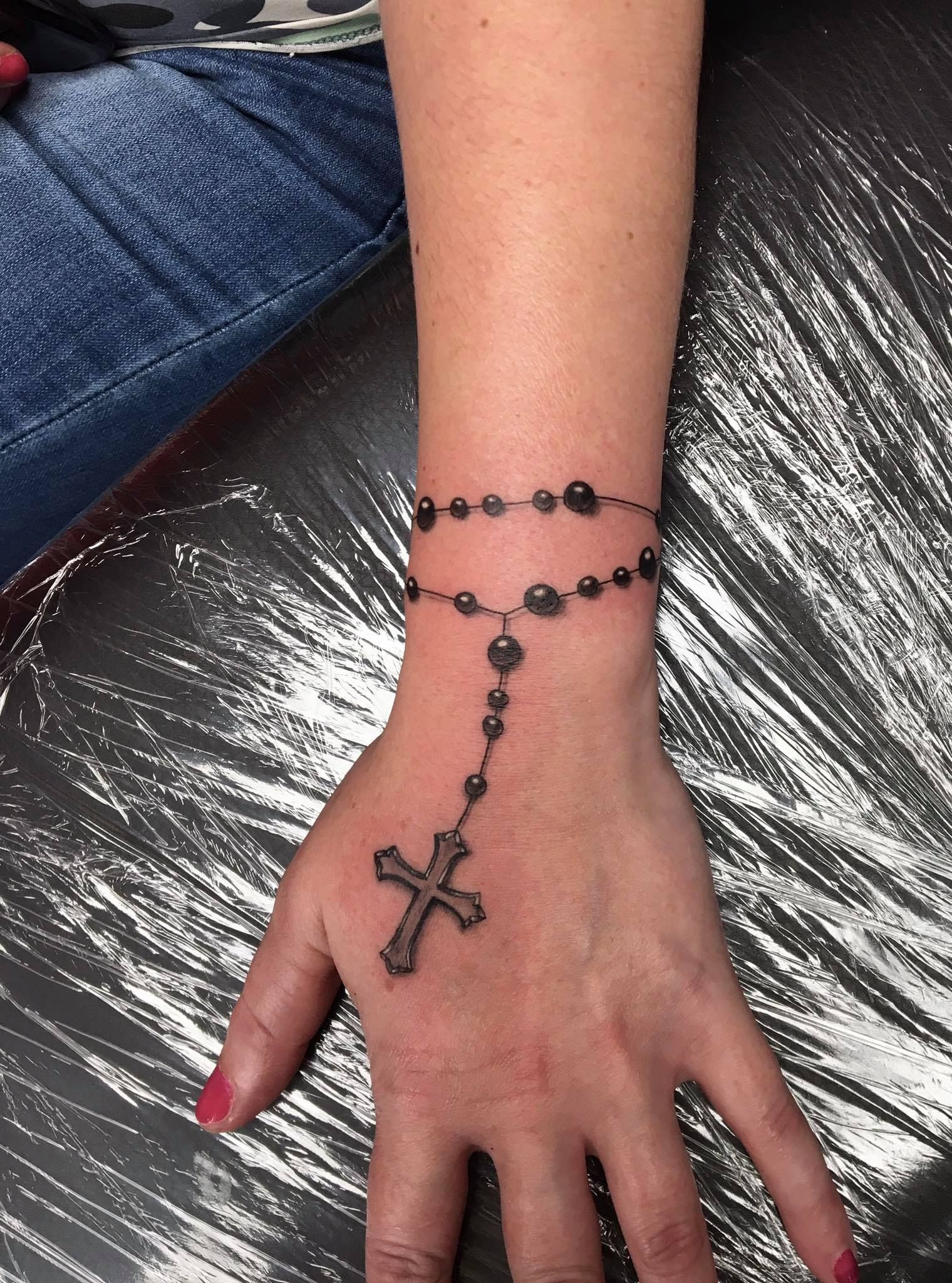 5 Ways to Showcase Female Rosary Hand Tattoos