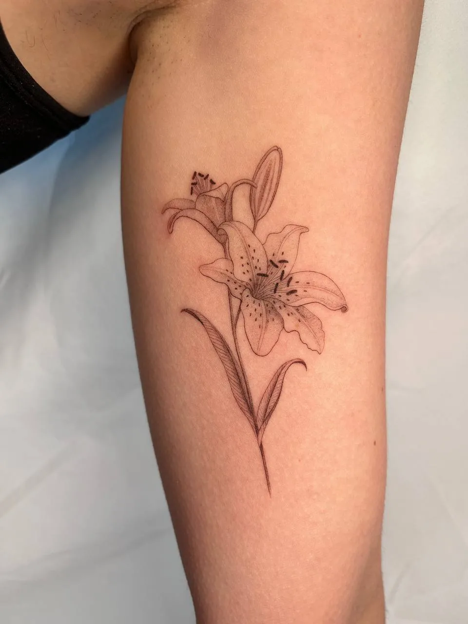 Fine Line Flower Tattoo Exquisite Floral Artistry By Masterful Tattoo