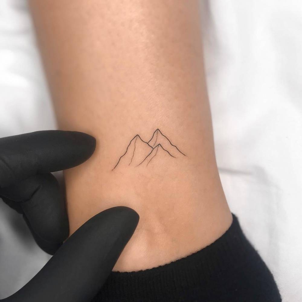 5 Stunning Fine Line Mountain Tattoo Ideas