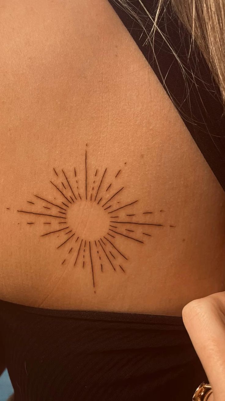 Fine Line Sun Tattoo Done On The Wrist