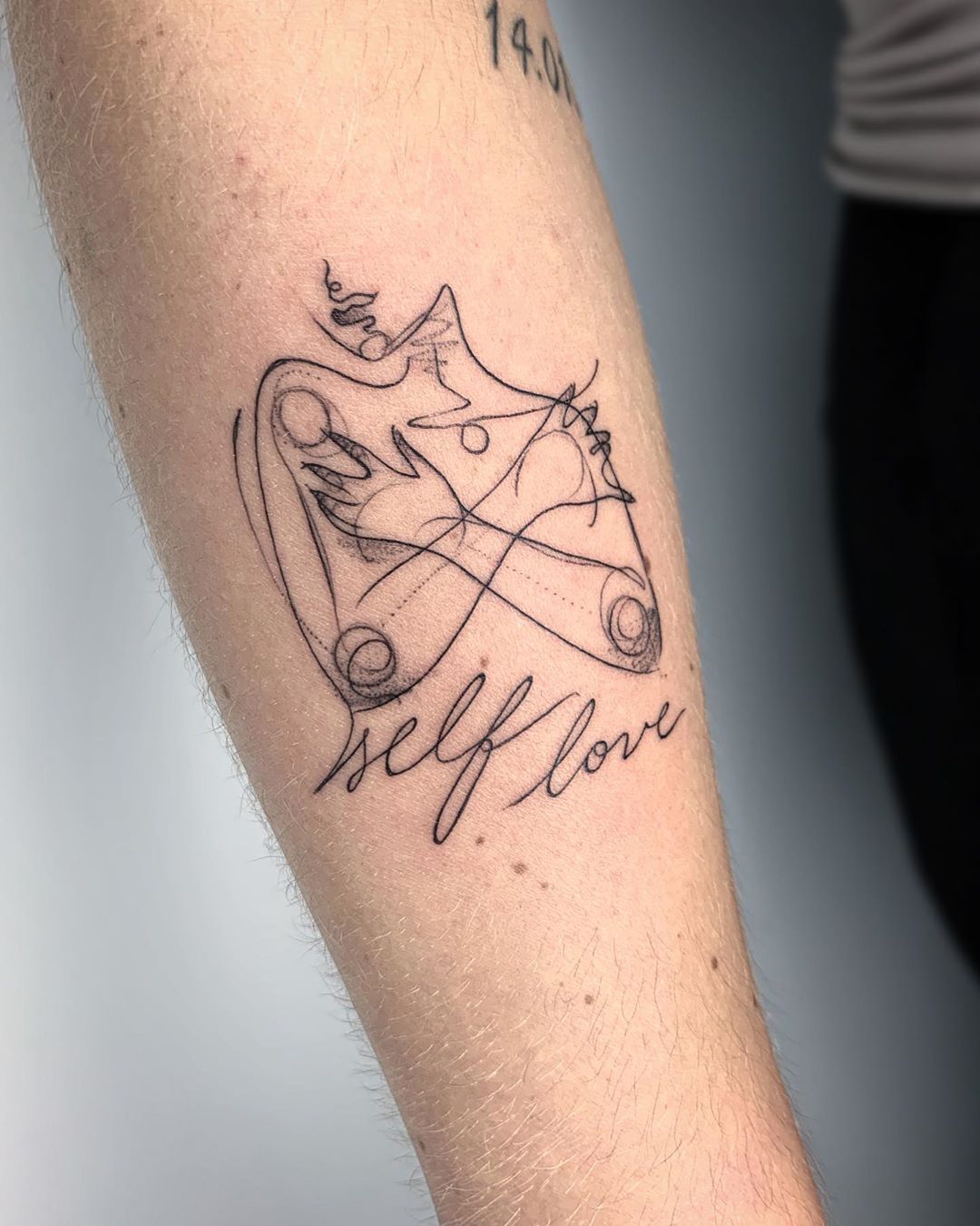 Fine Line Tattoo