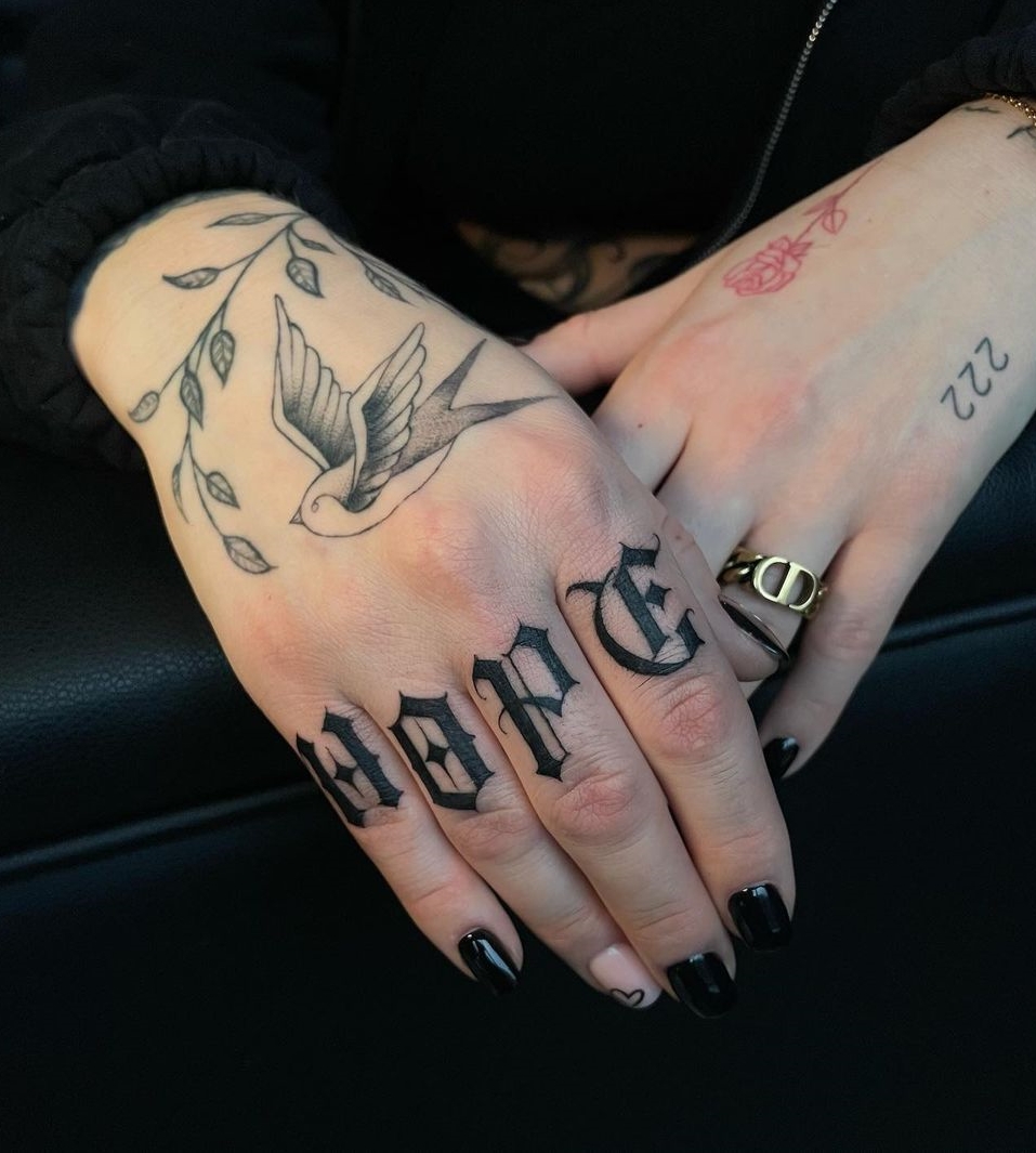 Finger Tattoos With The Words Unique And Meaning