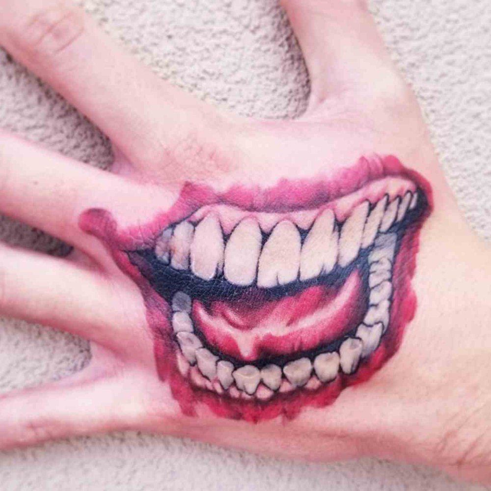 Get Your Joker Smile Hand Tattoo Real Vs Fake Edition Tattoo Glee