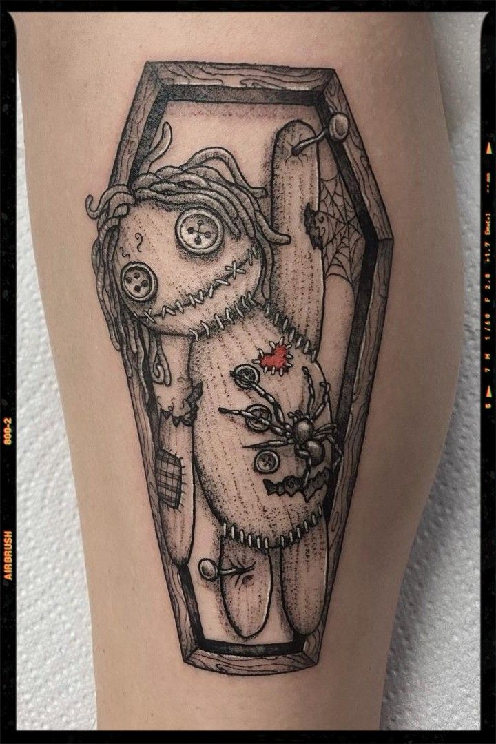 Gothic Voodoo Doll Tattoo: Dark and Enchanting Ink Inspiration