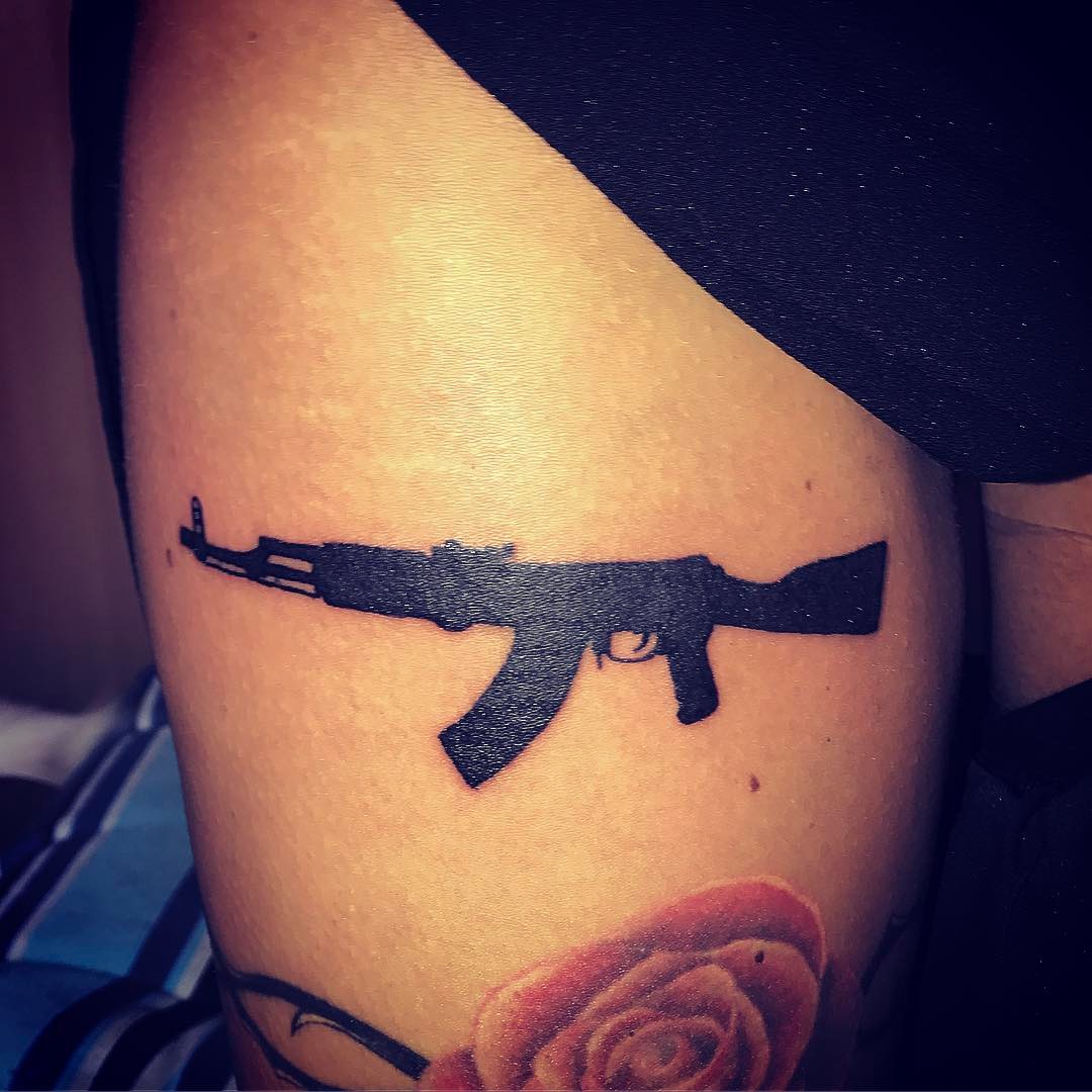 Gun Tattoos: Empowering Designs for Women