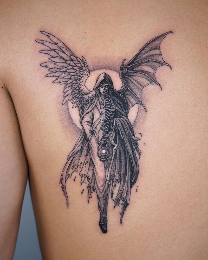 Half Angel Half Devil Tattoo Located On The Shoulder