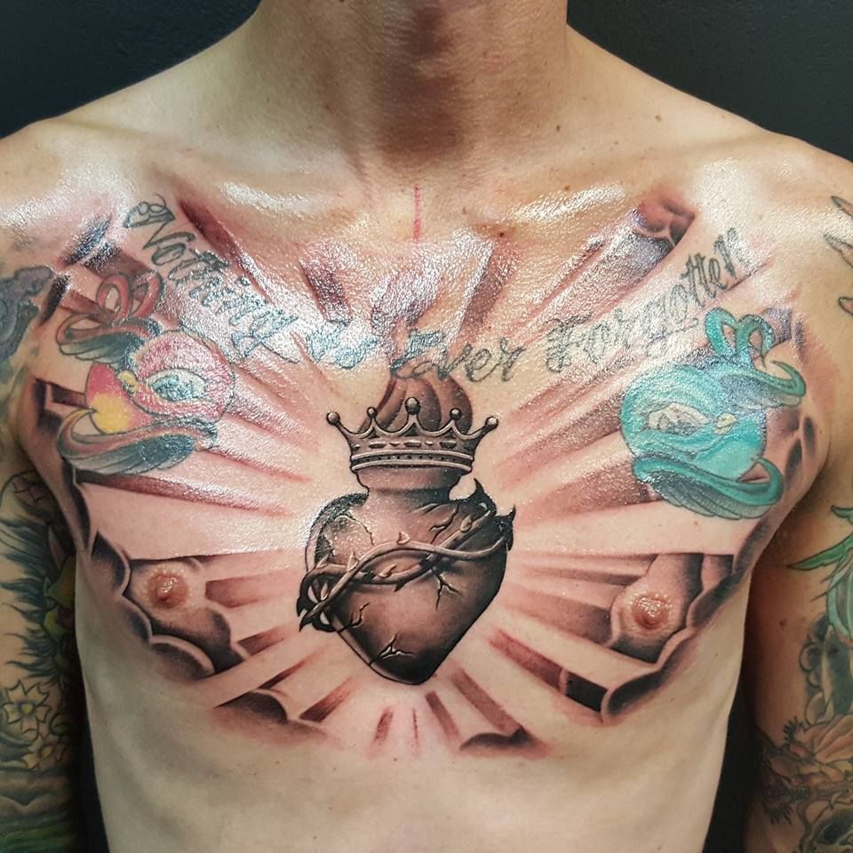 Heart Chest Tattoo Sacred Heart Tattoos Heart Tattoo Designs Chest Tattoo Heart