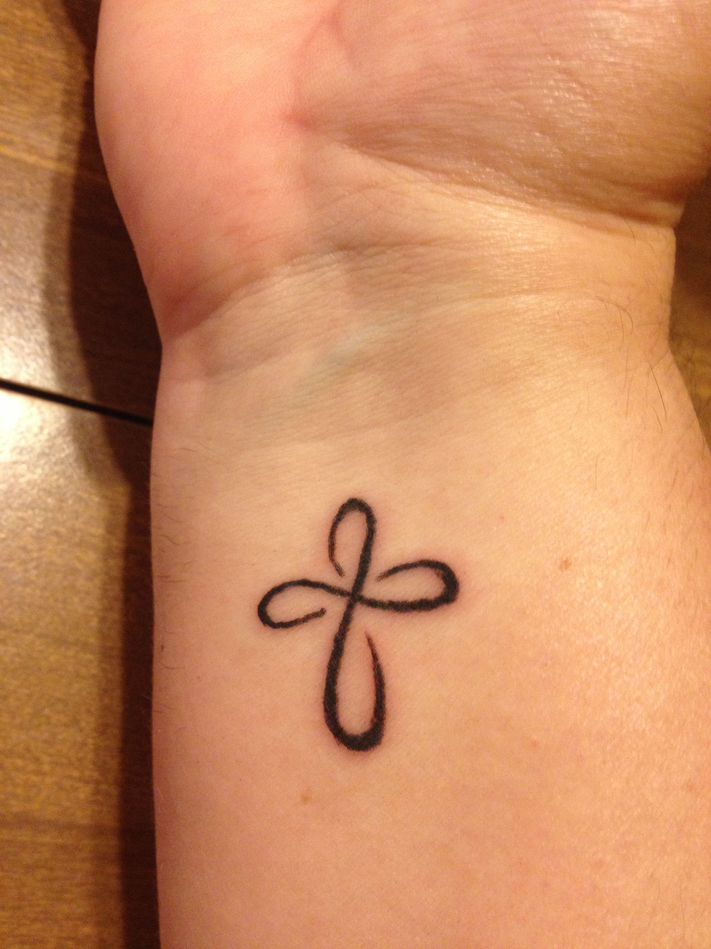 Infinity with Cross Tattoo: A Perfect Symbol of Eternal Faith