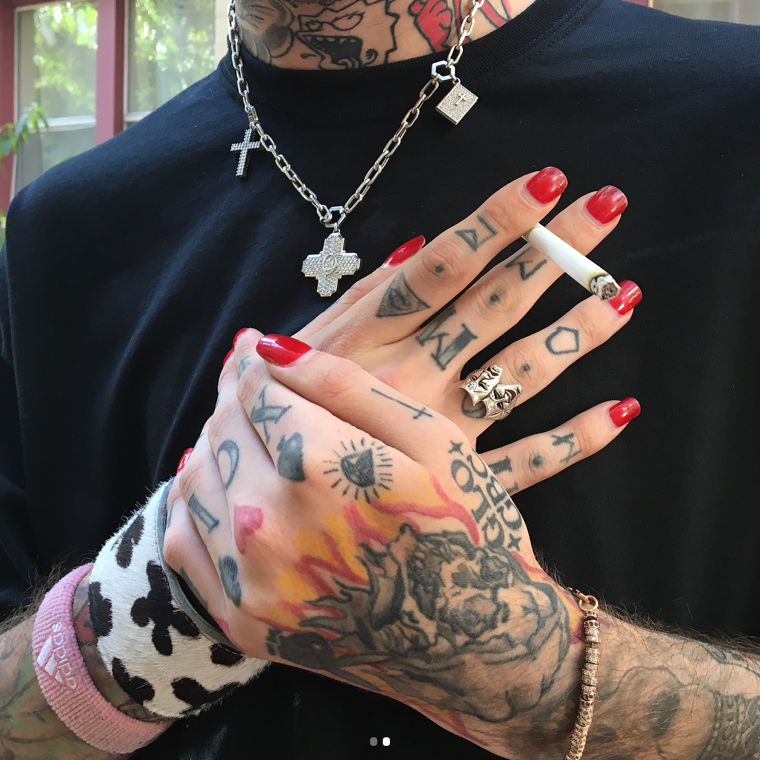 5 Hidden Meanings Behind Lil Peep's Hand Tattoos