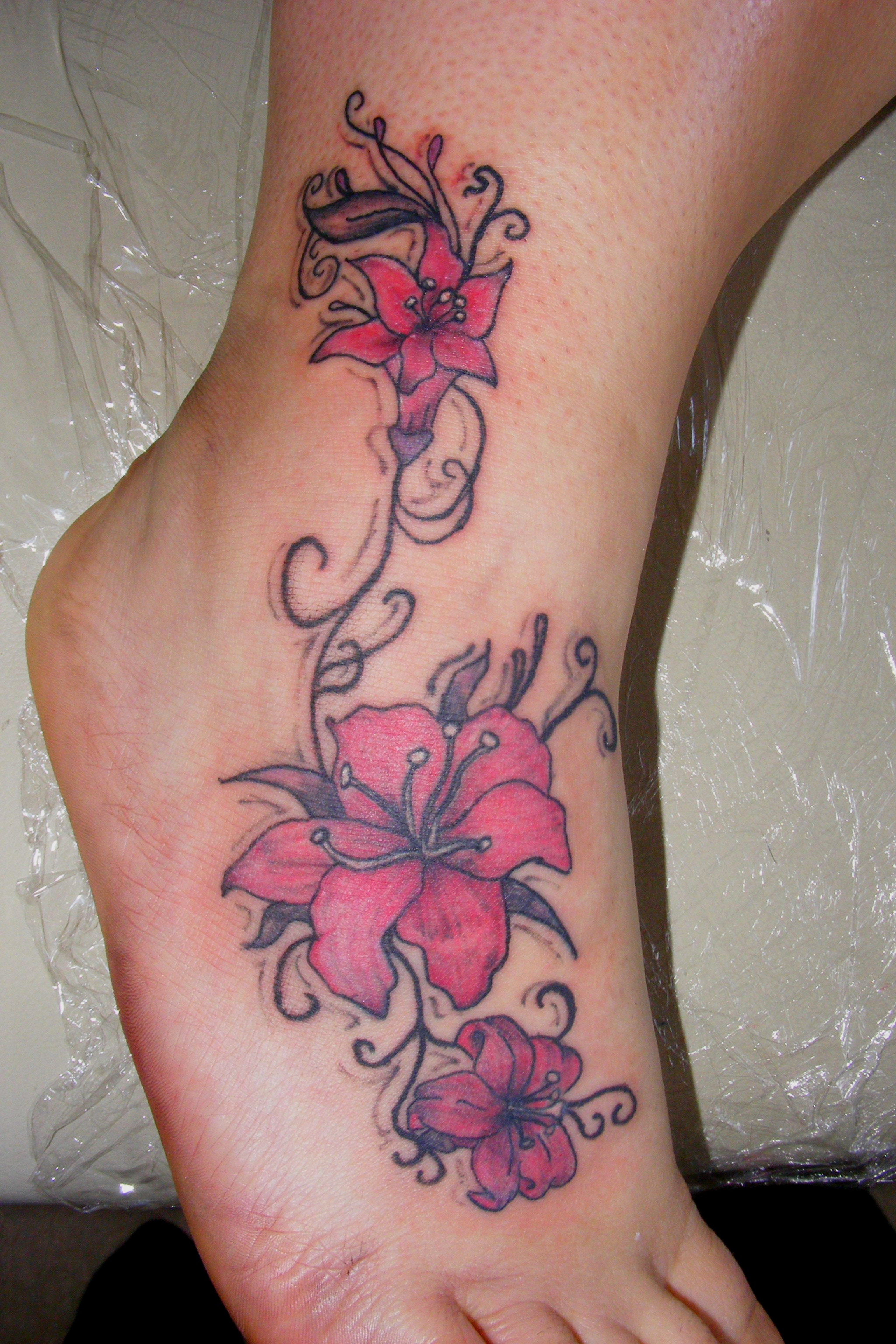 Lily Flower Tattoo Designs: Elegant Ink Ideas