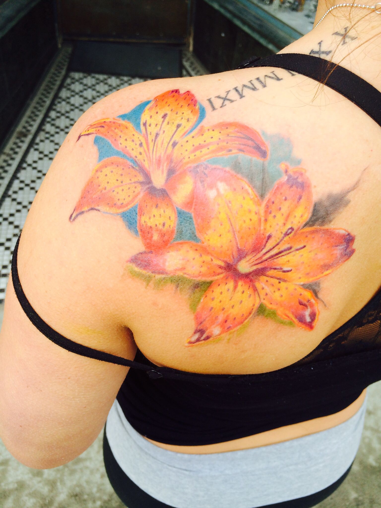 7 Symbolic Meanings Behind Tiger Lily Tattoos