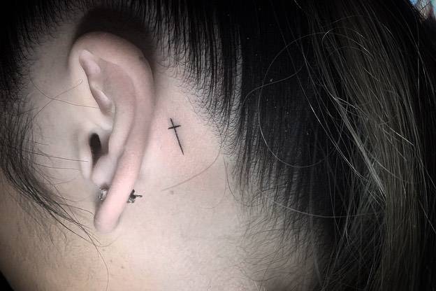 Minimalist Cross Tattoo Behind Ear