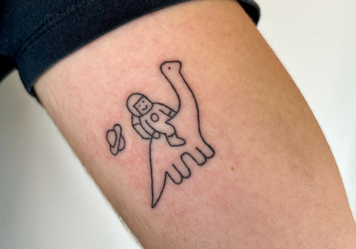 Minimalist Dinosaur Tattoo