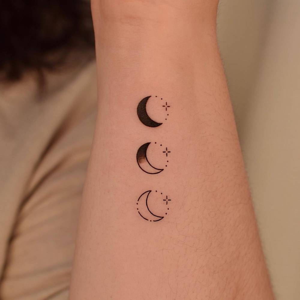 Minimalist Moon Phases Tattoo On The Inner Forearm