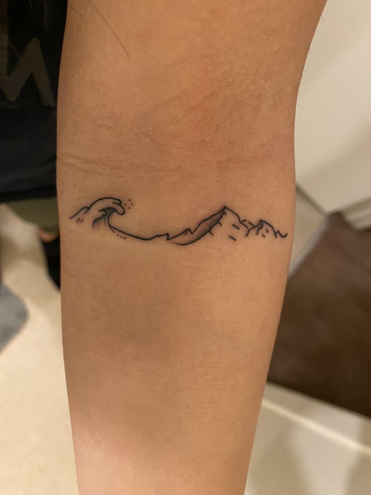 Mountain and Wave Tattoo: Symbolism and Designs