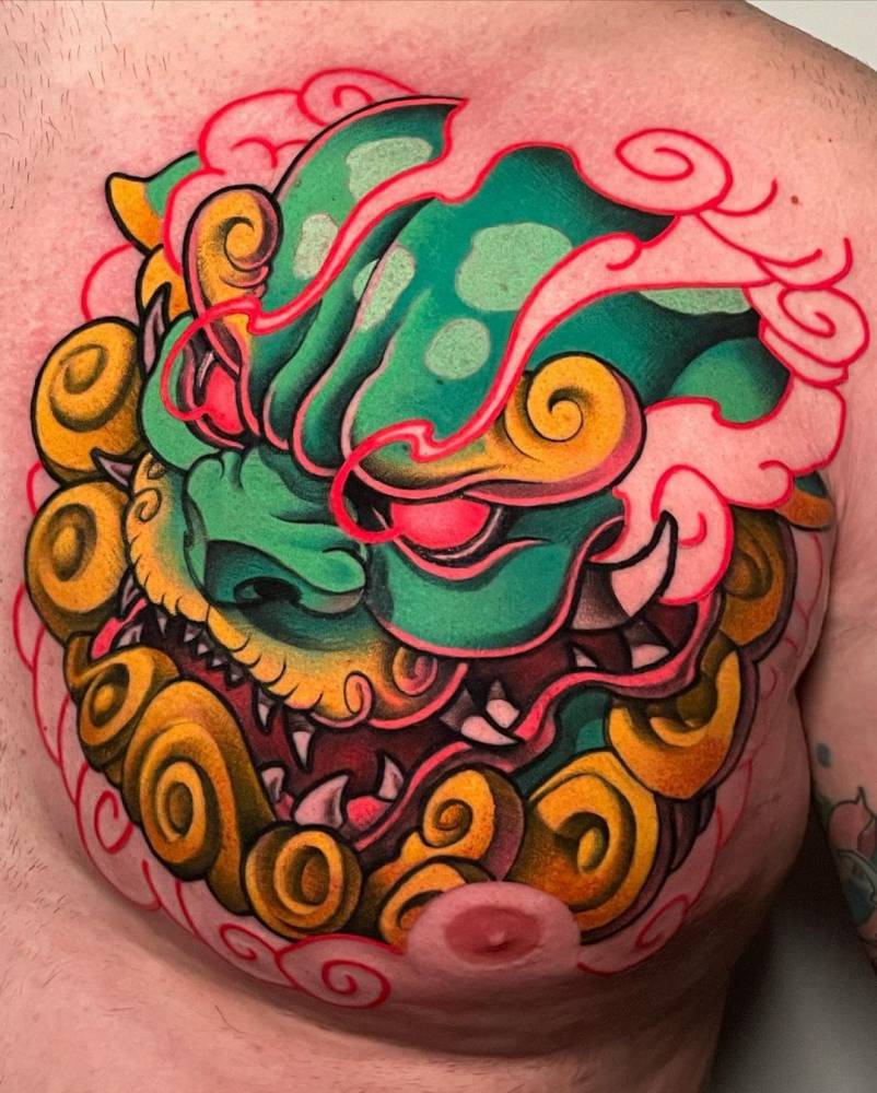 New School Style Foo Dog Tattoo Located On The Chest