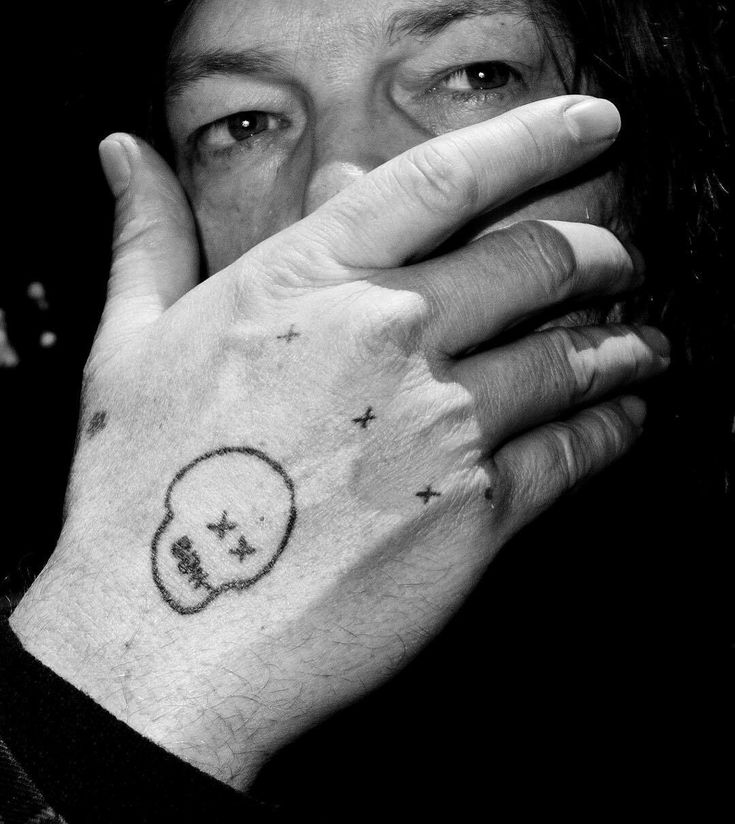 5 Secrets Behind Norman Reedus's Hand Tattoo Revealed