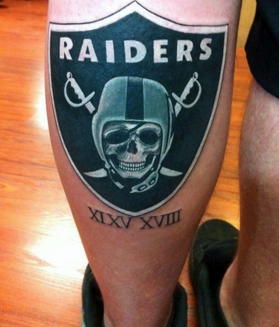 Oakland Raiders Logo And Tribal Tattoo On Shoulder Raiders Tattoos