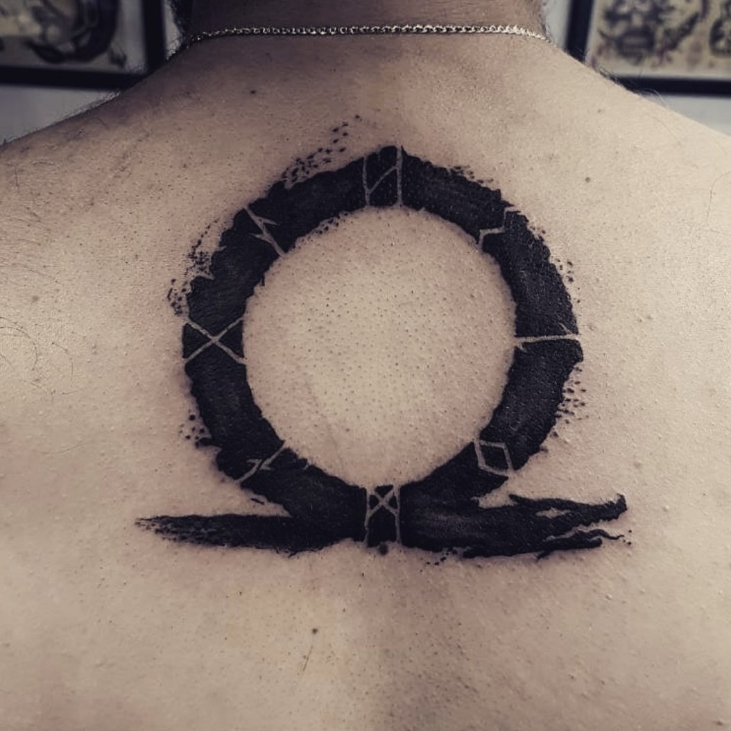 Unveiling the Omega God War Tattoo Symbol: Meaning and Mystique