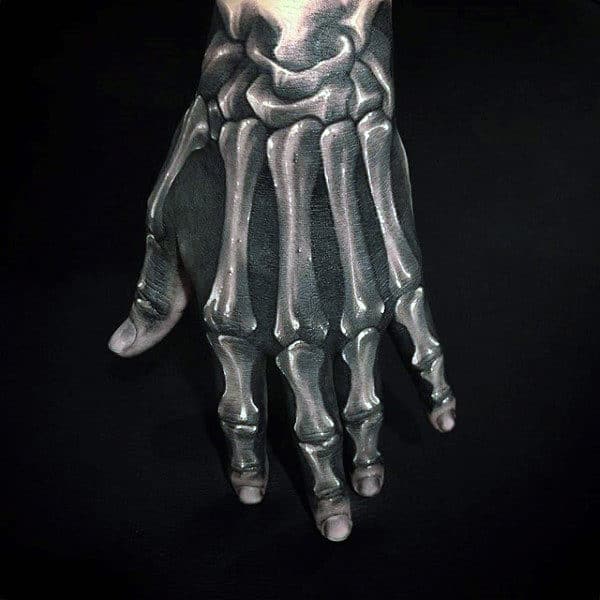 Realistic Skeleton Hand Tattoo Ideas for Spooky Style