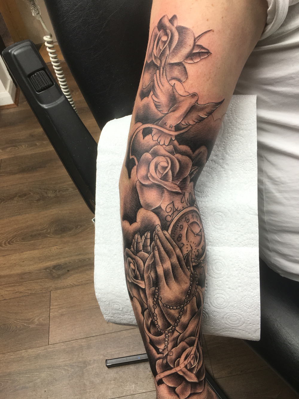 Divine Designs: Religious Forearm Sleeve Tattoo Ideas