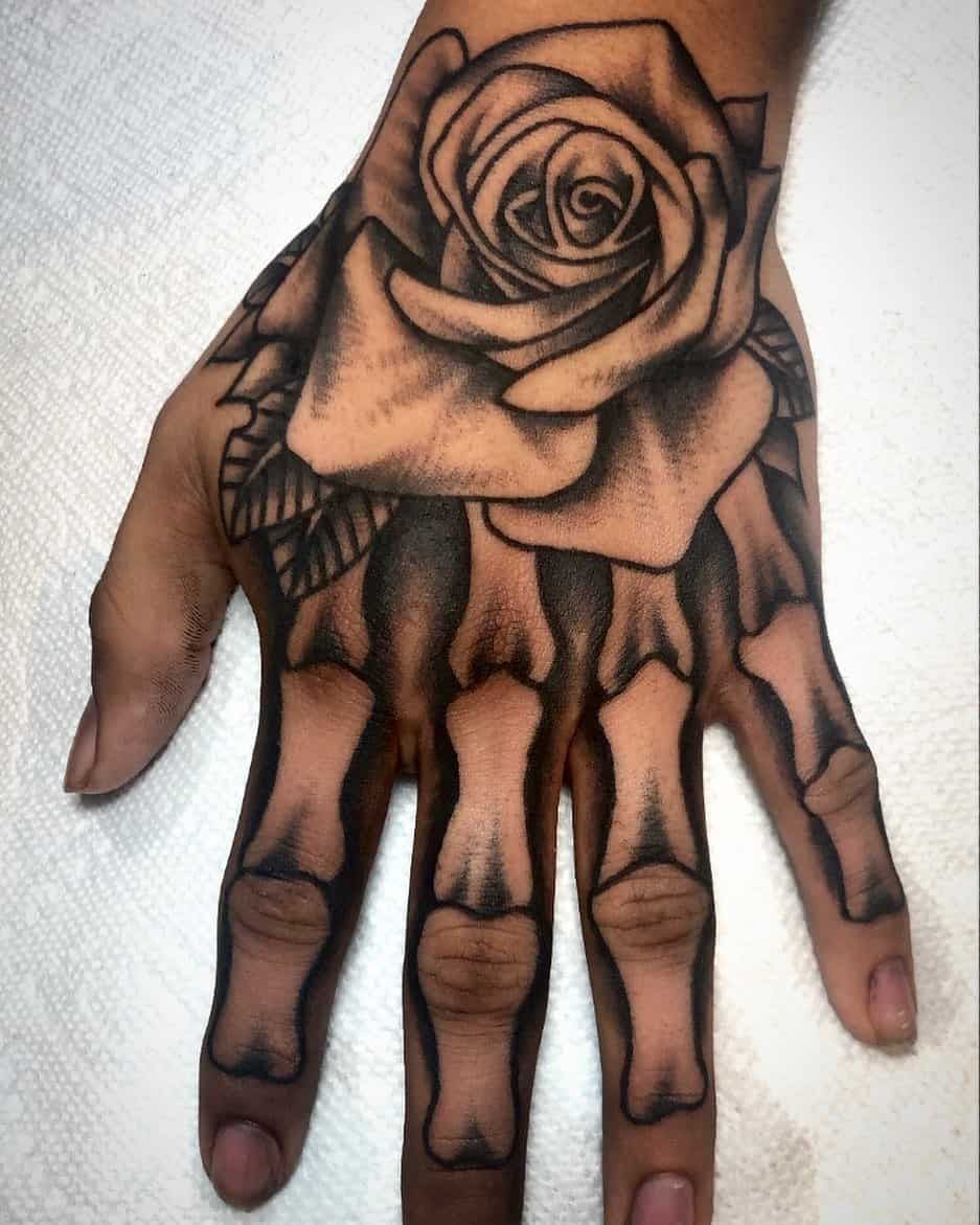 Rock And Roll Skeleton Hand Tattoo Instagram Vinktattoohk Skeleton Hand Tattoo Skull Hand