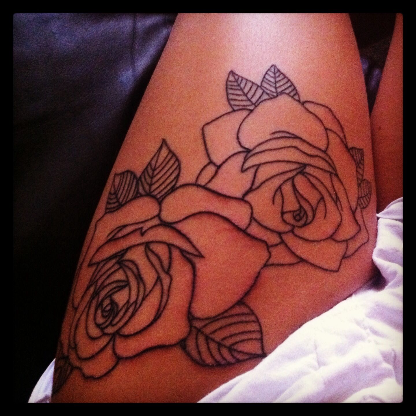 Rose Tattoos on Thigh: Meaningful Designs and Inspiration